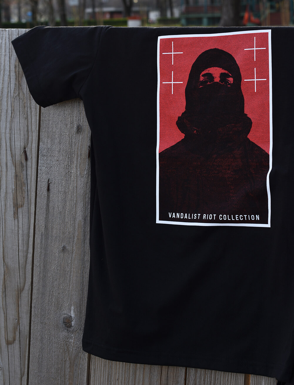 black vandalist t-shirt with print man with ski mask and text vandalist riot collection