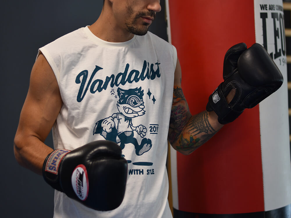 white sleveeless t-shirt with print of racoon in retro style